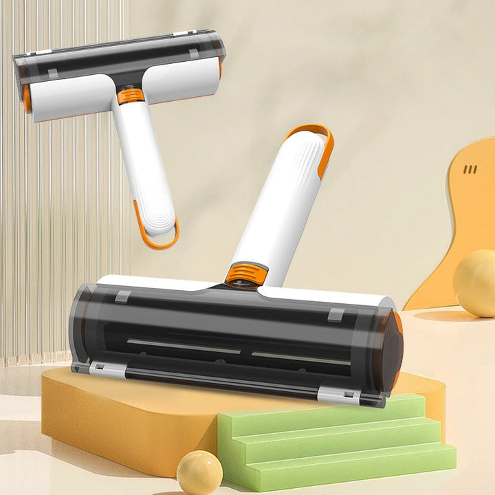 "Vit och orange bärbar hårrullare för husdjur av hållbart ABS-material, kompakt design för effektiv hårborttagning."