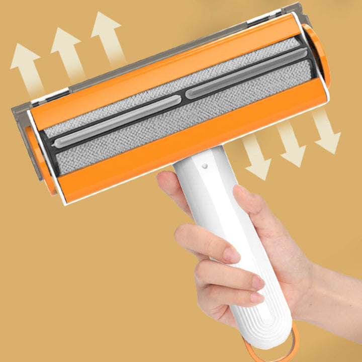 "Vit och orange bärbar hårrullare för husdjur av hållbart ABS-material, kompakt design för effektiv hårborttagning."